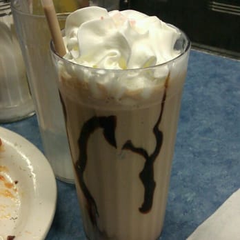 Mickey's Diner signature dishes The "One-and-One" (one egg, one slice of toast), Mulligan Stew, Patty Melt, classic milkshakes and malts
